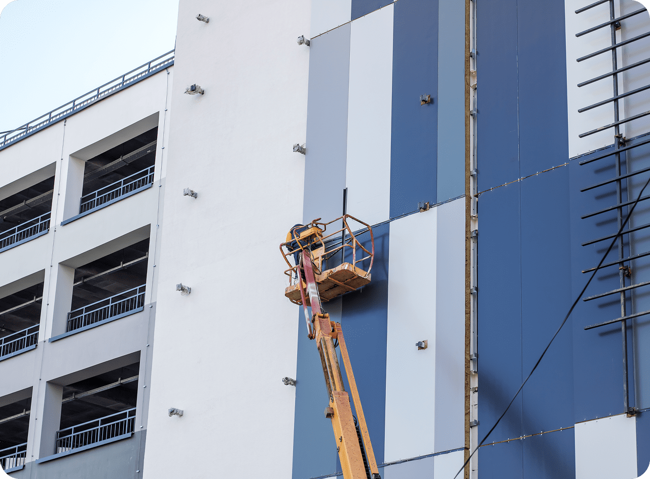 Construction worker on a lift platform