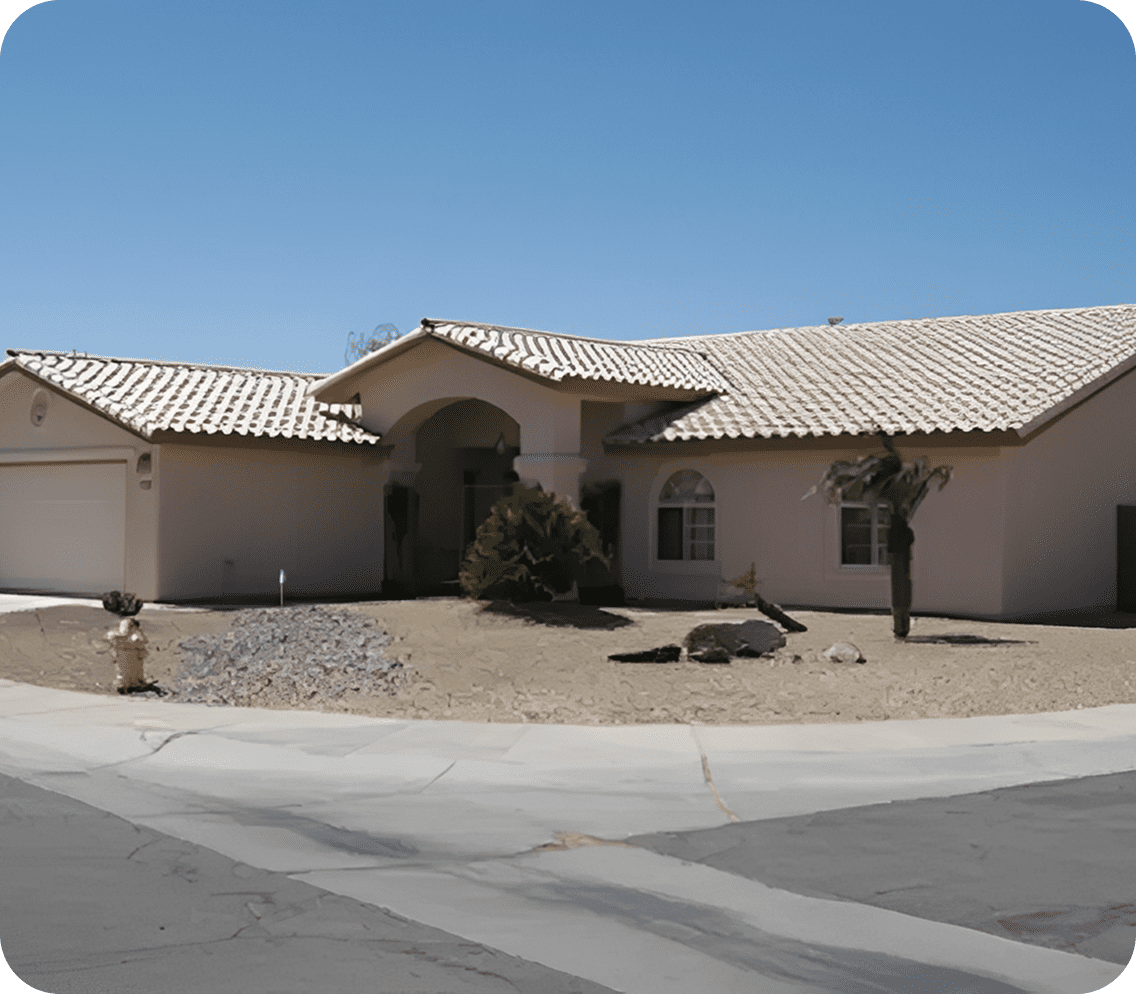 Modern home with tiled roof and garage